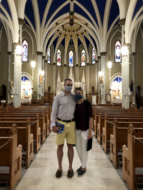 Ryan and Clara posing inside of St. Mary's Church in Ballston Spa, NY.